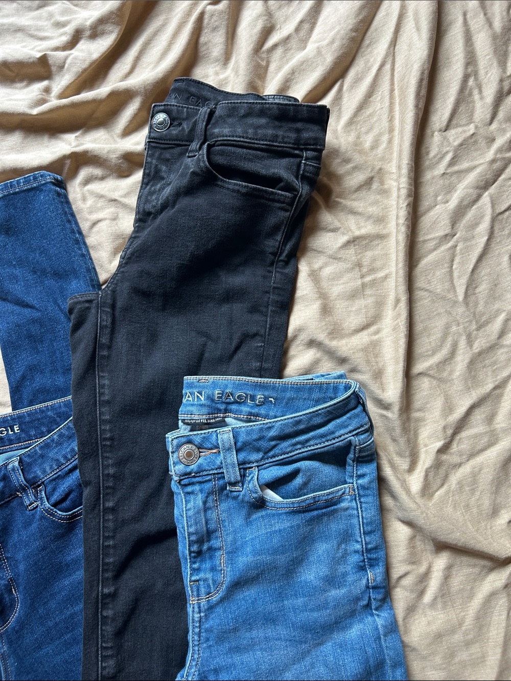 American Eagle Outfitters Skinny Jeans Trio in Dark Blue, Light Blue, and Black - Picture 4 of 7
